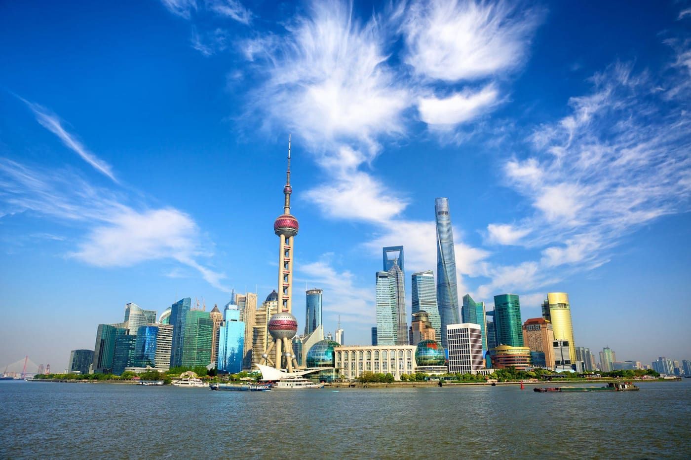 Shanghai's Pudong skyline with the Oriental Pearl Tower along the Huangpu River